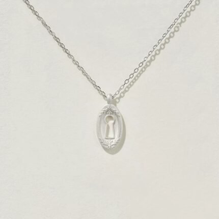Silver embossed keyhole necklace