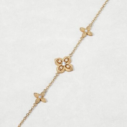 Engraved four-leaf clover bracelet